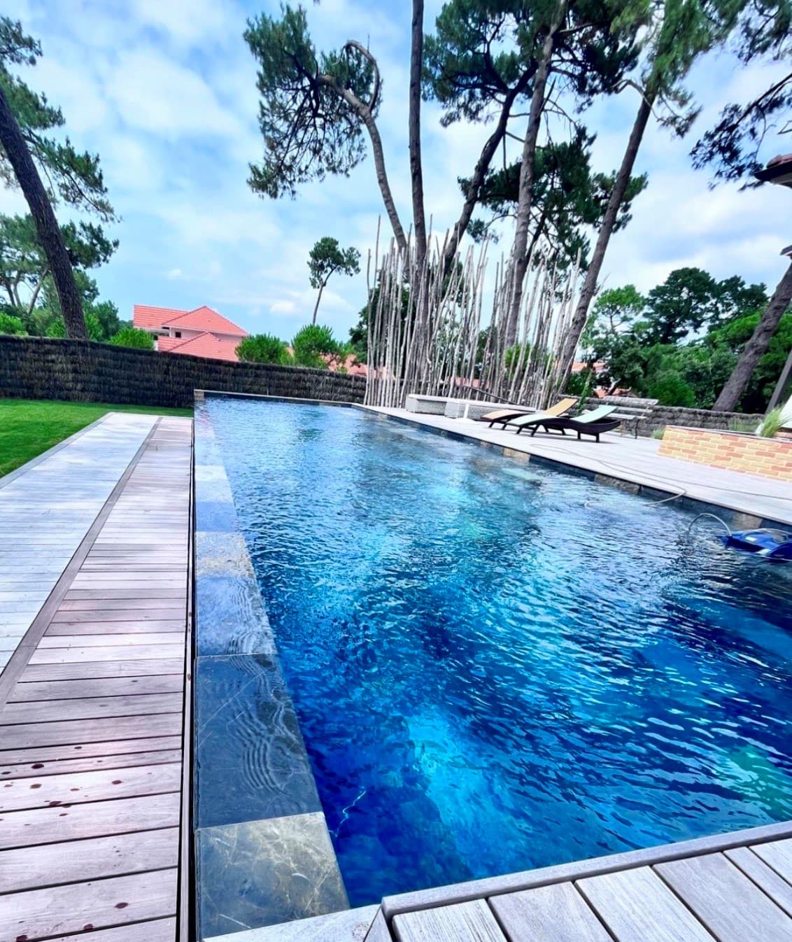 Piscine avec terrasse en bois au Cap Ferret